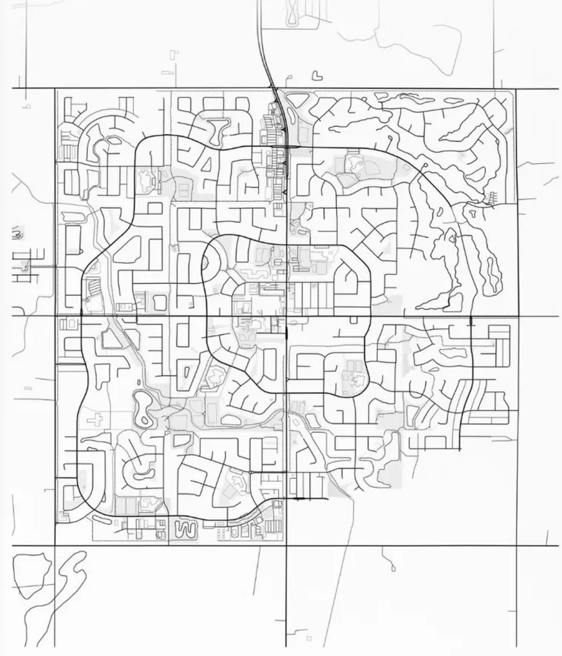 Black and white street map layout showing roads and residential blocks with curving streets and several bodies of water.